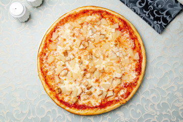pizza Hawaiian with pineapple and chicken