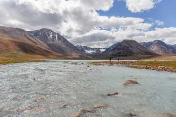 Western Mongolia mountainous landscape. View at Tsaagan Gol River, White River. Altai Tavan Bogd National Park, Bayan-Ulgii Province, Mongolia. © Tatiana
