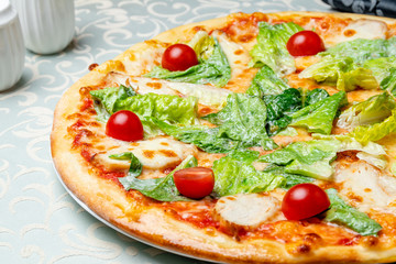 Pizza Caesar with chicken and tomatoes