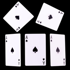 Playing cards for poker game on black background with clipping path.