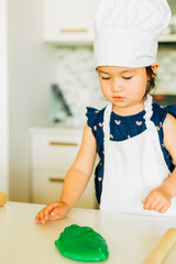 Toddler Girl Baking Cookies