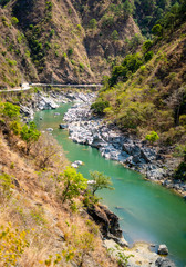 Fototapeta na wymiar Scenic view of a river along the road during during the trip to Benguet, Philippines