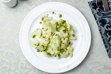 Fried cauliflower on a white plate