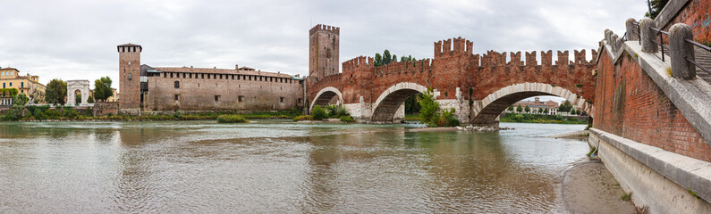 Ponte  Scaligero bridge, Castelvecchio castle and the area adjacent to them. View from the left bank of Adige river in Verona, Italy