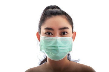 Beautiful young Asia woman putting on a medical mask to protect from airborne respiratory diseases as the flu covid-19 PM2.5 dust and smog, Women safety virus infection concept