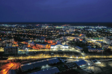 Fototapeta na wymiar Bright multi-colored lights of evening Ivanovo from a bird's eye view.