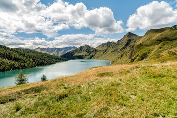 Fototapeta na wymiar Landscape of lake Ritom in Piora Valley, Ticino, Switzerland