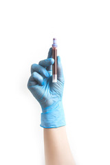 Coronavirus. Blood test tubes for a virus test in the hands of a diagnostician doctor in blue medical gloves on a white background. Diagnosis concept covid19