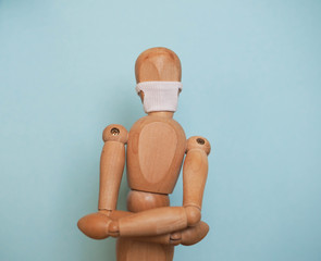 wooden mannequin in the mask