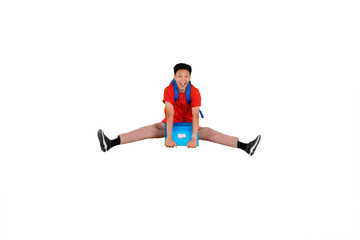 University student leaping with bag and folder