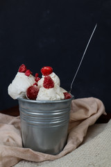 Vanilla ice cream with raspberry and strawberries