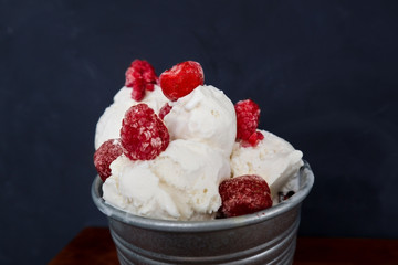 Vanilla ice cream with raspberry and strawberries