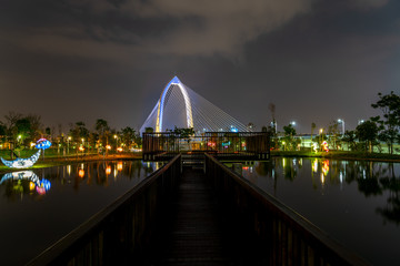 Nightscape of new landmark Konan Ai-Qin Bridge in Taichung City, Taichung Central Park at the Xitun District Shuinan Economic and Trade Area. The second largest park in Taiwan