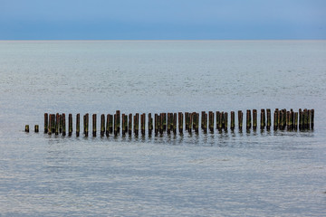 Landscape of sea with iron Breakwater. Black Sea, Poti, Georgia