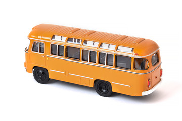 Scale model of a yellow Russian bus. Toy yellow bus