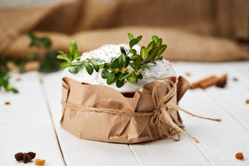 Glazed Easter cake on white wooden background, Traditional Kulich, Paska  ready for celebration
