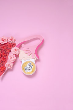 Creative concept of gynecological disease. Metaphor, illustration of the dermoid cyst of the ovary. Women's reproductive system, paper art concept with flowers. Copy space for text