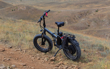 Electric bike on a hill in the mountains