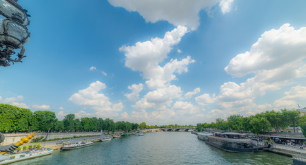 Fototapeta premium Clouds over Seine river in Paris