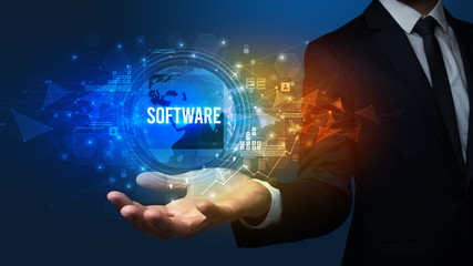 Elegant hand holding SOFTWARE inscription, digital technology concept