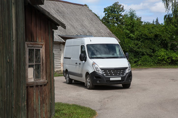 Minibus in the courtyard of a village