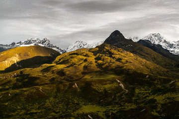 a beautiful mountain view with fog and clouds