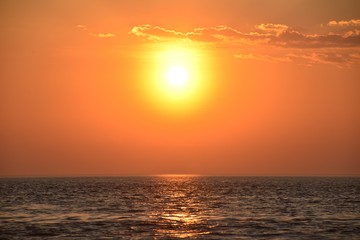 Fototapeta na wymiar Jersey sunset, U.K. Spring ocean seascape.