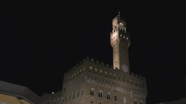 Palazzo Vecchio tower in Piazza Signoria, Italian city of Florence. Night shot. Warm winter night. 