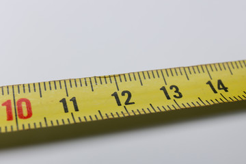 Metric tape measure on a white background