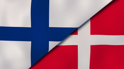 Fototapeta premium The flags of Finland and Denmark. News, reportage, business background. 3d illustration