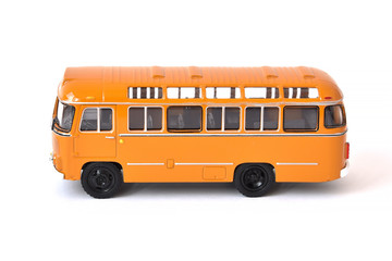 Scale model of a yellow Russian bus. Toy yellow bus