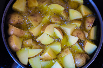 Frying potatoes in the pan