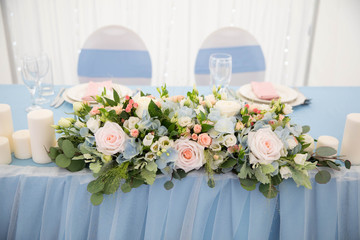 Elements of the wedding ceremony. Wedding decoration. Wedding table decoration with flowers