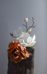 Artificial Flower Bouquet in Metal Boot Rust Colored and White
