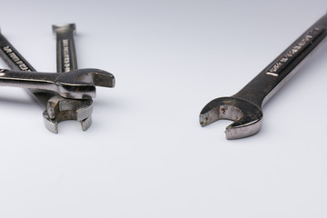 Mechanics wrenches practicing social distancing