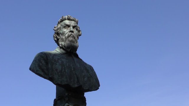 Bust of Benvenuto Cellini installed on the Ponte Vecchio bridge in the Italian city of Florence. Tuscany, Italy.