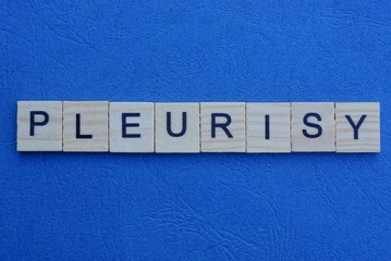word pleurisy made from gray letters lies on a blue background