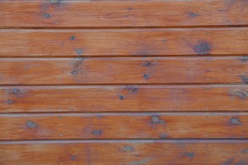 Naklejka premium brown wooden texture from old wide boards in the fence wall