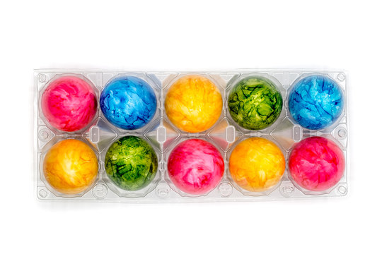 colorful easter eggs in plastic holder