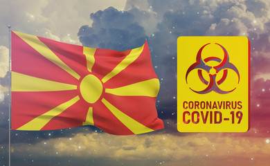 COVID-19 Visual concept - Coronavirus COVID-19 biohazard sign with flag of North Macedonia. Pandemic 3D illustration.