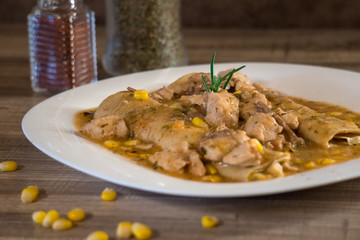 pieces of pork with corn