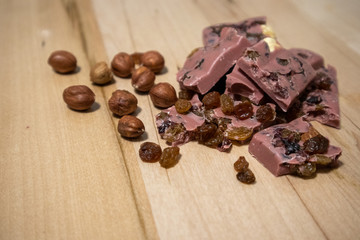 Pink Chocolate Chocolate with nuts, raisins and cranberries. Tasty.