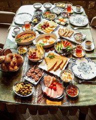 breakfast set with various food on the table