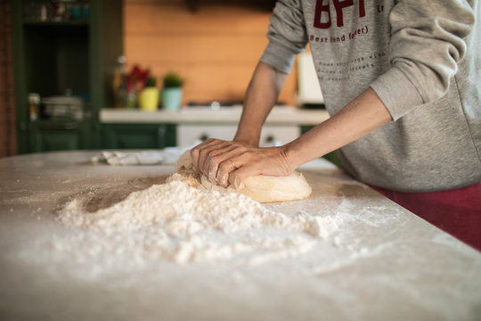 Woman Kneading Dough