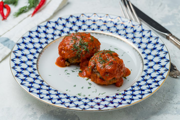 Beef cutlet with tomato sause