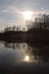 Obraz premium sun set over the lake