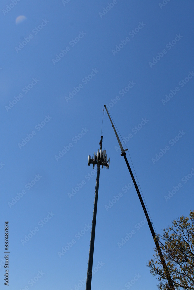 Poster communication tower and crane