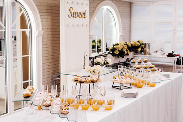 Banquet table with juice and dessert