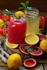 Lemon and orange fresh juice in glasses
