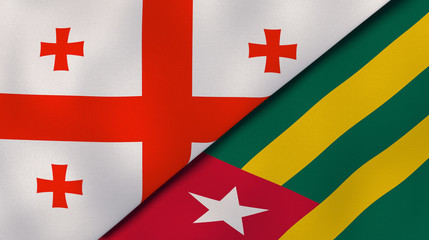 The flags of Georgia and Togo. News, reportage, business background. 3d illustration